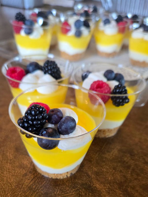 Assorted desserts including brownies and verrines by Dezzie Bakery